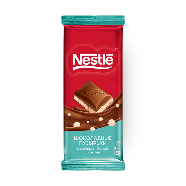 Шоколад молочный и белый Nestle пористый