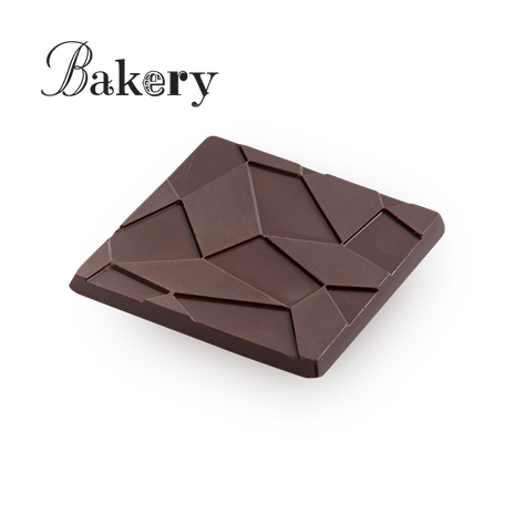 Bakery tables of dark chocolate and cocoa beans