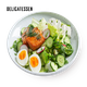 Delicatessen green and salmon salad with goat cheese