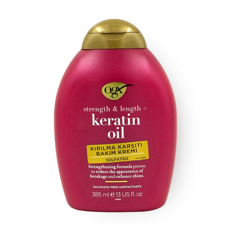 Кондиционер против ломкости волос OGX с кератиновым маслом