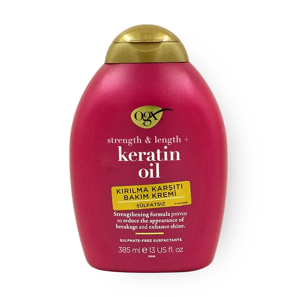 Кондиционер против ломкости волос OGX с кератиновым маслом
