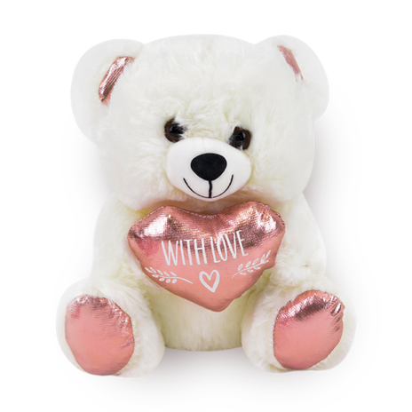 Teddy bear holding a rose gold heart