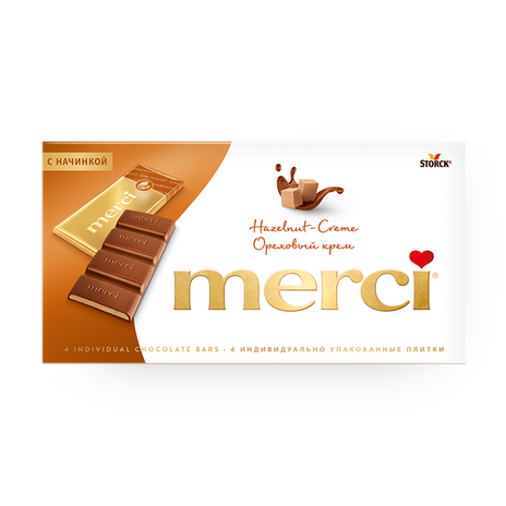 Шоколад молочный Merci ореховый крем