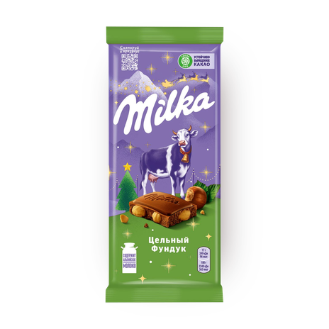 Шоколад молочный Milka с цельными лесными орехами