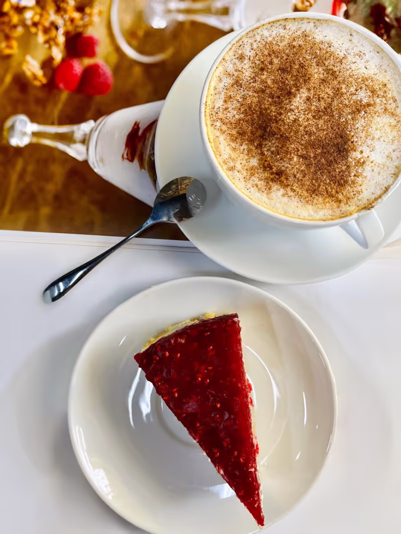 Raspberry cheesecake and latte