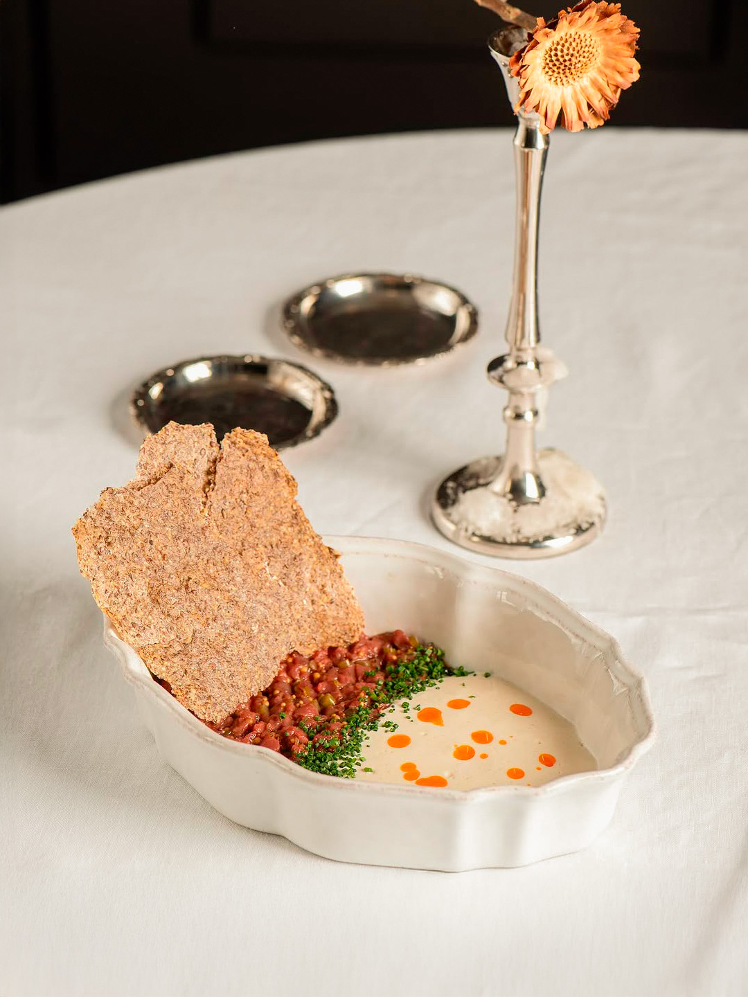 Horsemeat tartare, smoked kurt mousse and flax chips