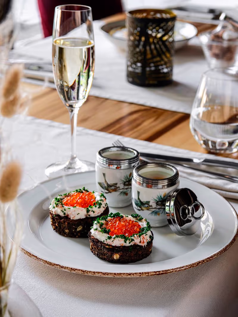 Coddled eggs on Borodino bread with sockeye caviar